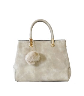 T10447 - Bolso de mano forma de trapecio con asa rígida y borla a juego
