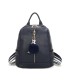 T11698 - Mochila con borla de color espaciosa con un compartimento y cremallera