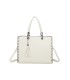 T11702 - Bolso cuadrado con borla y tachuelas