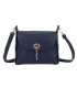 T11768 - Bolso pequeño con adorno de pluma dorada