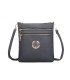 T11802 - Bandolera mini flor con emblema