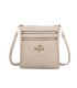 T11802 - Bandolera mini flor con emblema