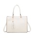 T11827 - Bolso con neceser rectangular y decoraciones de tachuelas