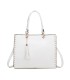 T11827 - Bolso con neceser rectangular y decoraciones de tachuelas