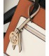 T11575 - Bolso con bandolera de estilo bicolor con un bolsillo de cremallera frontal