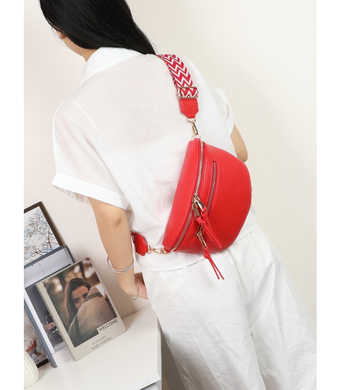 T11570 - Bolso estilo riñonera con borlas