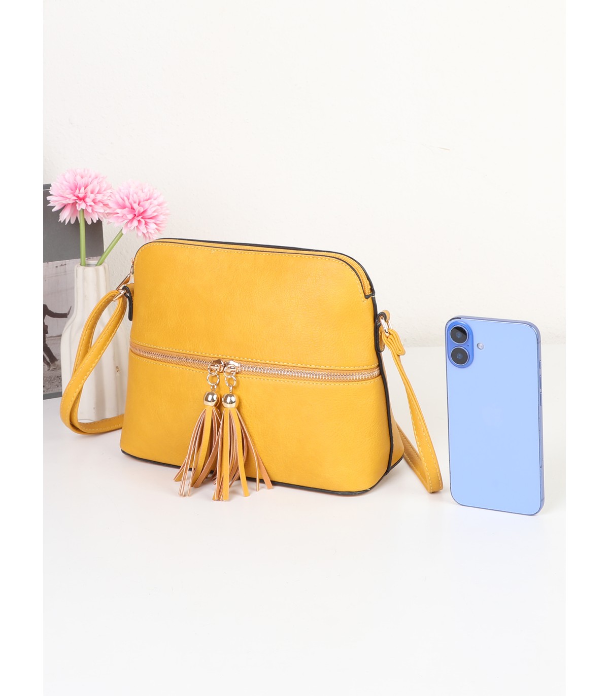 R9354-1- Bolso bandolera con borlas de adorno