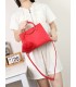 T11513 - Bolso bandolera con asas de metal redondas y borla a juego