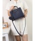 T11513 - Bolso bandolera con asas de metal redondas y borla a juego
