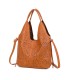 T11928-Bolso tipo Hobo o de hombro, caracterizado por un diseño artístico con calados