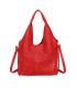 T11928-Bolso tipo Hobo o de hombro, caracterizado por un diseño artístico con calados