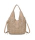 T11928-Bolso tipo Hobo o de hombro, caracterizado por un diseño artístico con calados