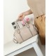 T11844 - Bolso rectangular casi redondo con decoración de bolitas