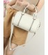T11844 - Bolso rectangular casi redondo con decoración de bolitas