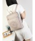 T11514 - Mochila con bordado para mujer con adorno a juego