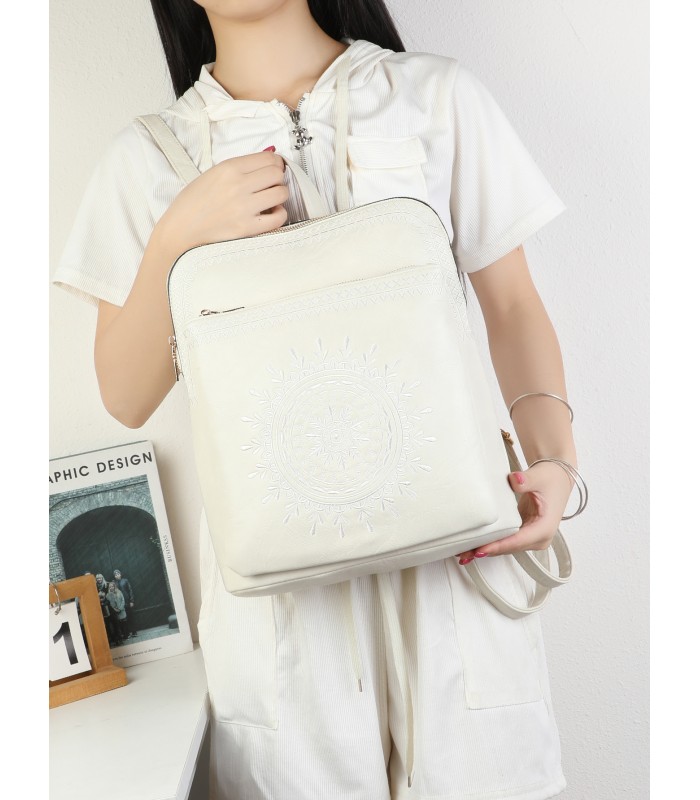 T11514 - Mochila con bordado para mujer con adorno a juego