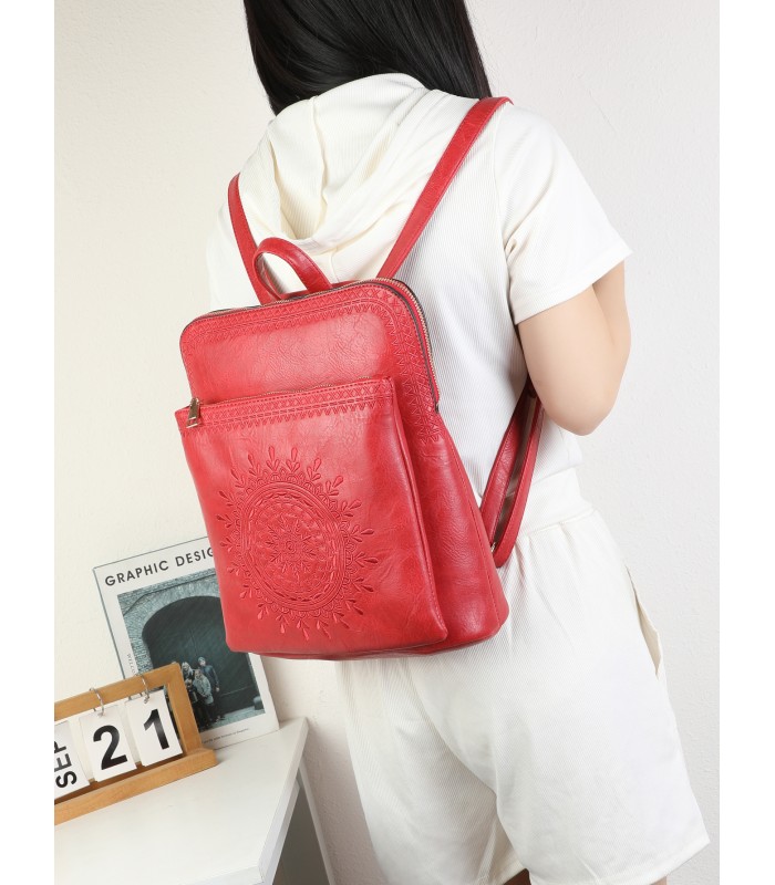 T11514 - Mochila con bordado para mujer con adorno a juego